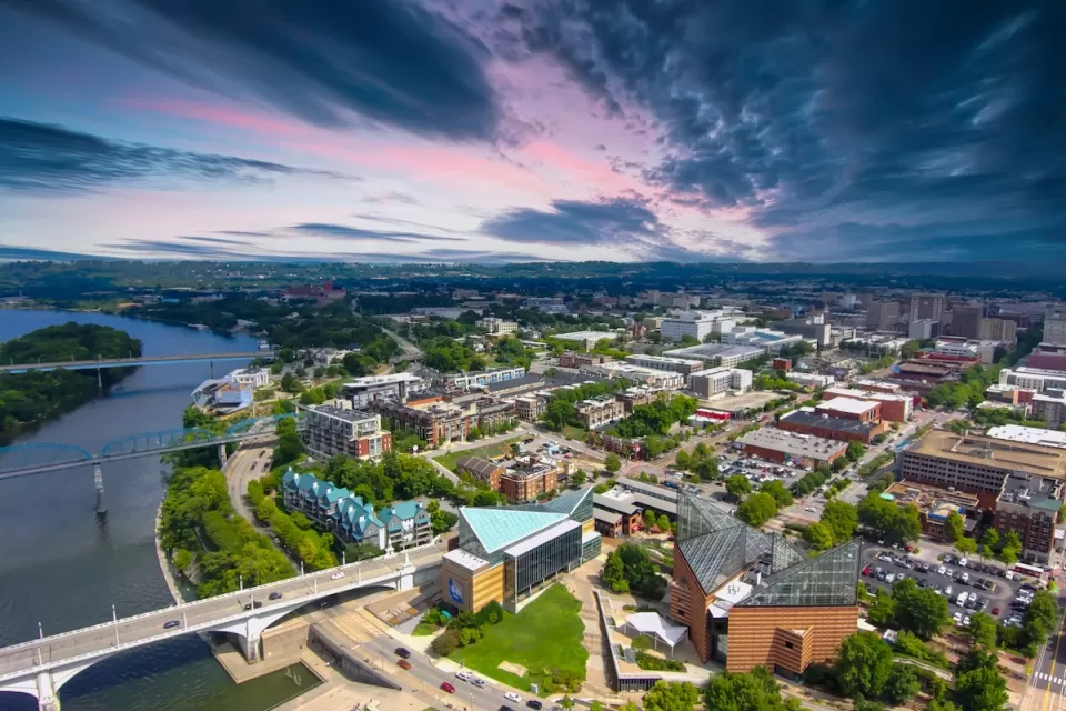 Aerial view of Chattanooga, Tennessee with a colorful sunset sky.